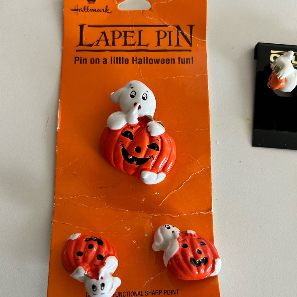 Halloween earrings and pin by Hallmark.